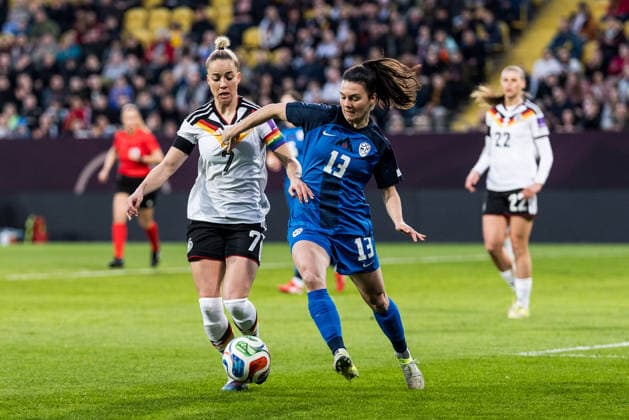DRESDEN, GERMANY - MARCH 3: Giulia Gwinn (Germany, 7) and Zala Kustrin (Slovenia, 13) battle for the ball during the Women s European Qualifiers for the 2027 FIFA Women s World Cup match between Women s European Qualifiers for the 2027 FIFA Women s World Cup: Germany vs Slovenia at Ulrich-Haberland-Stadion on matchday 1 of the Women s European Qualifiers for the 2027 FIFA Women s World Cup on March 3, 2026 in Dresden, Germany. Saxony Germany Copyright: xSteffiexWunderlx