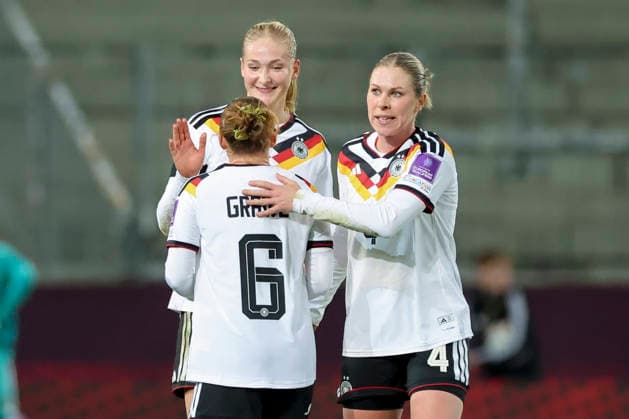 Lisanne Graewe Germany, Camilla Kuever Germany and Rebecca Knaak Germany cheer, 2027 FIFA Women s World Cup Qualifier, Germany v Slovenia, Rudolf Harbig Stadion on 03 March 2026 in Dresden, Germany Photo by Marco Steinbrenner DeFodi Images Lisanne Graewe Germany, Camilla Kuever Germany and Rebecca Knaak Germany cheer, 2027 FIFA Women s World Cup Qualifier, Germany v Slovenia, Rudolf Harbig Stadion, March 3, 2026 in Dresden, Germany Photo by Marco Steinbrenner DeFodi Images