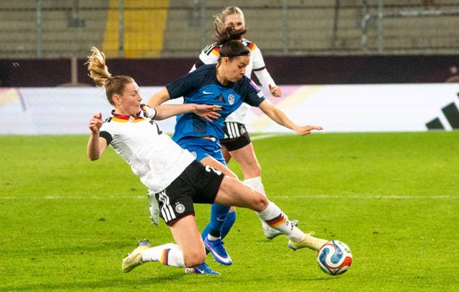 3 3 2026, Soccer, GER, Women, World Cup Qualification, Matchday 1, Germany Slovenia, Sarai Linder Germany, left against Nina Kajzba Slovenia, right Dresden Rudolf Harbig Stadium Saxony Germany