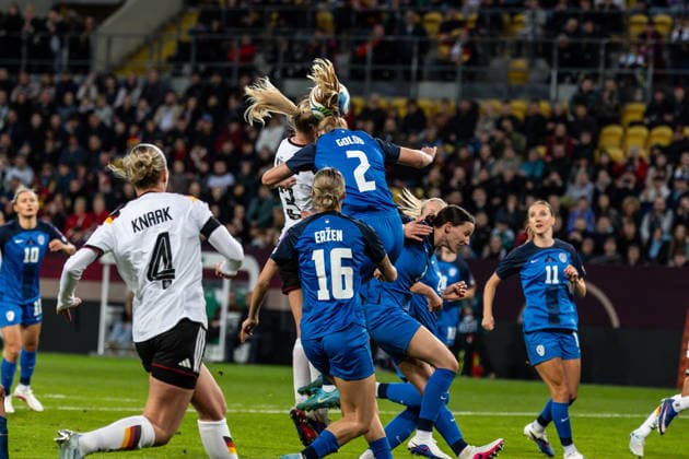 GER, UEFA Qualification for the FIFA Womens World Cup 2027, Germany Slovenia 03 03 2026, Rudolf Harbig Stadium, Dresden, GER, UEFA Qualification for the FIFA Womens World Cup 2027, Germany Slovenia Camilla Küver Germany 3 in a duel against Lana Golob Slovenia 2 Â nordphotoxGmbHxx xAlexanderxTrienitz nph00051
