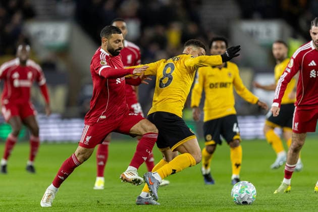 Wolverhampton Wanderers v Liverpool, Premier League Wolverhampton Wanderers midfielder Joao Gomes (8) battles for possession with Liverpool forward Mohamed Salah (11) during the Premier League match between Wolverhampton Wanderers and Liverpool at Molineux, Wolverhampton, UK on 3 March 2026. Wolverhampton Molineux West Midlands UK Editorial use only DataCo restrictions apply See www.football-dataco.com , Copyright: xManjitxNarotrax PSI-23833-0010