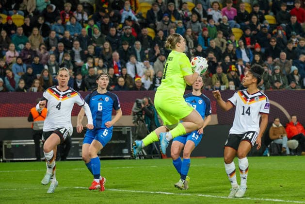 Dresden, Germany 03 March 2026 International match for Womens World Cup Qualification Germany Women vs Slovenia Women In the picture from left the third goalkeeper Zala Mersnik Slovenia holds the ball and prevents a goal for Germany Copyright: HMBxMedia MadeleinexFantini