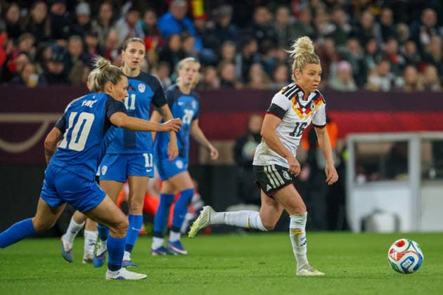 Dresden, Germany 03 March 2026 International match for Womens World Cup Qualification Germany Women vs Slovenia Women In the picture from left Dominika Conc Slovenia and Linda Dallmann Germany in a running duel Copyright: HMBxMedia MadeleinexFantini