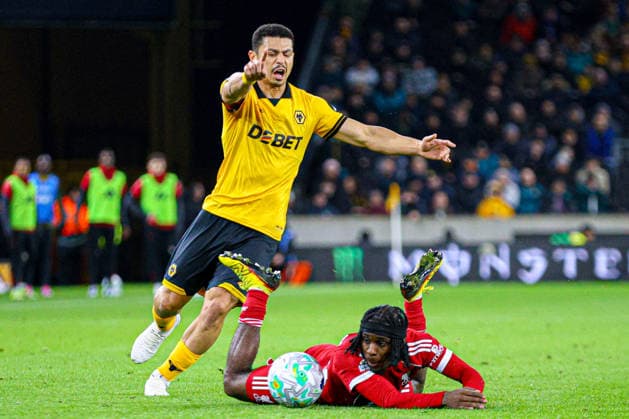 WOLVERHAMPTON, ENGLAND - March 03: Andre of Wolves fouls Jeremie Frimpong of Liverpool during the Premier League football match between Wolverhampton Wanderers and Liverpool at Molineux stadium on March 03, 2026 in Wolverhampton, England. (Photo by Natalie Mincher Sports Press Photo) Copyright: xNataliexMincher SPPx Sportspressphoto_SPR101108
