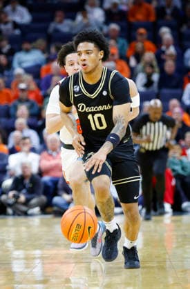 March 03, 2026: Wake Forest Demon Deacons Guard 10 Sebastian Akins dribbles the ball up the court during a NCAA, College League, USA Men s Basketball game between the Wake Forest Demon Deacons and the University of Virginia Cavaliers at John Paul Jones Arena in Charlottesville, VA. CSM Charlottesville United States of America - ZUMAc04_ 20260303_zma_c04_023 Copyright: xJustinxCooperx