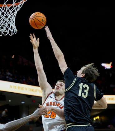 March 03, 2026: Virginia Cavaliers Forward 28 Thijs De Ridder throws up a shot over Wake Forest Demon Deacons Forward 13 Cooper Schwieger during a NCAA, College League, USA Men s Basketball game between the Wake Forest Demon Deacons and the University of Virginia Cavaliers at John Paul Jones Arena in Charlottesville, VA. CSM Charlottesville United States of America - ZUMAc04_ 20260303_zma_c04_041 Copyright: xJustinxCooperx