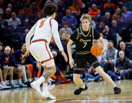 March 03, 2026: Wake Forest Demon Deacons Guard 7 Isaac Carr looks to get around Virginia Cavaliers Guard 5 Sam Lewis during a NCAA, College League, USA Men s Basketball game between the Wake Forest Demon Deacons and the University of Virginia Cavaliers at John Paul Jones Arena in Charlottesville, VA. CSM Charlottesville United States of America - ZUMAc04_ 20260303_zma_c04_042 Copyright: xJustinxCooperx