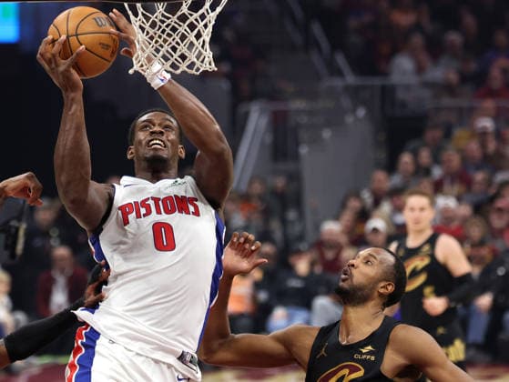 Detroit Piston s Jalen Duren (0) puts up a shot over Cleveland Cavalier s Evan Mobley (4) during the second quarter in Cleveland, Ohio Tuesday March 3, 2026. The Cavaliers defeated the Pistons 113-109.  CLE20260303110 AARONxJOSEFCZYK