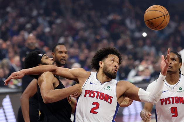 Detroit Piston s Cade Cunningham (2) grabs a rebound over Cleveland Cavalier s Jarrett Allen (31) in the first quarter in Cleveland, Ohio Tuesday March 3, 2026. The Cavaliers defeated the Pistons 113-109.  CLE20260303114 AARONxJOSEFCZYK