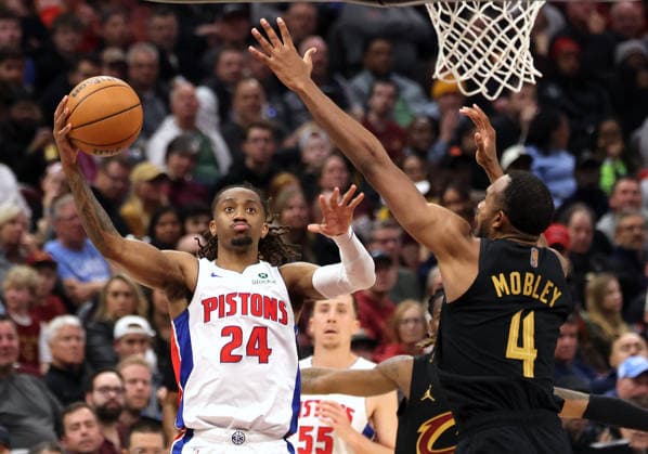 Detroit Piston s Daniss Jenkins (24) shoots over Cleveland Cavalier s Evan Mobley (4) during the fourth quarter in Cleveland, Ohio Tuesday March 3, 2026. The Cavaliers defeated the Pistons 113-109.  CLE20260303120 AARONxJOSEFCZYK