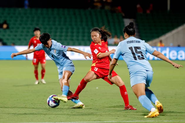SOCCER ASIAN CUP VIETNAM INDIA, Huynh Nhu of Vietnam is tackled by Shilky Devi Hemam of India during the AFC Women™s Asian Cup Group C match between Vietnam and India at HBF Park in Perth, Wednesday, March 4, 2026. ( NO ARCHIVING, EDITORIAL USE ONLY PERTH WESTERN AUSTRALIA AUSTRALIA  Copyright: xRICHARDxWAINWRIGHTx 20260304115473525065