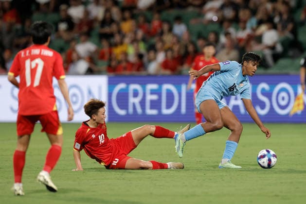 SOCCER ASIAN CUP VIETNAM INDIA, Manisha Kalyan of India is tackled by Tran Thi Hai Linh of Vietnam during the AFC Women™s Asian Cup Group C match between Vietnam and India at HBF Park in Perth, Wednesday, March 4, 2026. ( NO ARCHIVING, EDITORIAL USE ONLY PERTH WESTERN AUSTRALIA AUSTRALIA  Copyright: xRICHARDxWAINWRIGHTx 20260304158732174122