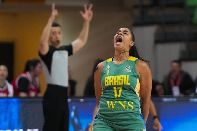 (260304) -- CHANGSHA, March 4, 2026 -- Carina dos Santos Martins of Brazil celebrates during a warm-up match between China and Brazil in Changsha, central China s Hunan Province, on March 4, 2026. ) (SP)CHINA-CHANGSHA-BASKETBALL-WARM UP MATCH-CHN VS BRA(CN) ChenxZhenhai 