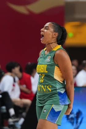 (260304) -- CHANGSHA, March 4, 2026 -- Carina dos Santos Martins of Brazil celebrates during a warm-up match between China and Brazil in Changsha, central China s Hunan Province, on March 4, 2026. ) (SP)CHINA-CHANGSHA-BASKETBALL-WARM UP MATCH-CHN VS BRA(CN) ChenxZhenhai 