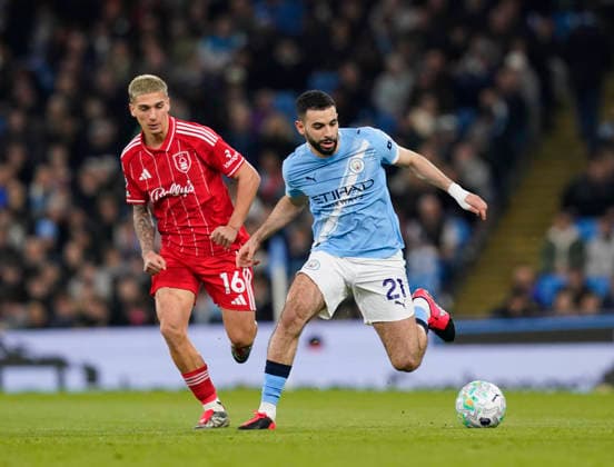 Manchester, England, 4th March 2026. Nicolas Dominguez of Nottingham Forest and Rayan Alt-Nouri of Manchester City during the Manchester City vs Nottingham Forest Premier League match at the Etihad Stadium, Manchester. Picture credit should read: Andrew Yates Sportimage EDITORIAL USE ONLY. No use with unauthorised audio, video, data, fixture lists, club league logos or live services. Online in-match use limited to 120 images, no video emulation. No use in betting, games or single club league player publications. SPI_025_AY_Manchester_City_Forest SPI-4576-0024
