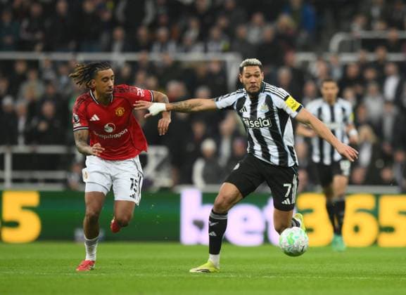 Joelinton of Newcastle United fends off Leny Yoro of Manchester United, ManU Newcastle United v Manchester United, Premier League, Football, St James Park, Newcastle, UK - 04 Mar 2026Newcastle St James Park United Kingdom EDITORIAL USE ONLY No use with unauthorised audio, video, data, fixture lists, club league logos or live services. Online in-match use limited to 120 images, no video emulation. No use in betting, games or single club league player publications.  Copyright: xRichardxLee Shutterstockx 16723964u