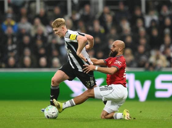 Bryan Mbeumo of Manchester United, ManU slides in with a challenge on Lewis Hall of Newcastle United Newcastle United v Manchester United, Premier League, Football, St James Park, Newcastle, UK - 04 Mar 2026Newcastle St James Park United Kingdom EDITORIAL USE ONLY No use with unauthorised audio, video, data, fixture lists, club league logos or live services. Online in-match use limited to 120 images, no video emulation. No use in betting, games or single club league player publications.  Copyright: xRichardxLee Shutterstockx 16723964z