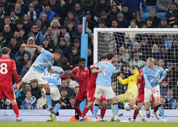 Manchester, England, 4th March 2026. Rodri of Manchester City heads their second goal during the Manchester City vs Nottingham Forest Premier League match at the Etihad Stadium, Manchester. Picture credit should read: Andrew Yates Sportimage EDITORIAL USE ONLY. No use with unauthorised audio, video, data, fixture lists, club league logos or live services. Online in-match use limited to 120 images, no video emulation. No use in betting, games or single club league player publications. SPI_071_AY_Manchester_City_Forest SPI-4576-0070