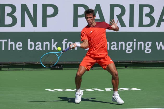 INDIAN WELLS, CA - MARCH 04: Mariano Navone (ARG) hits a forehand during the BNP Paribas Open on March 4, 2026 at Indian Wells Tennis Garden in Indian Wells, CA. (Photo by George Walker Icon Sportswire) TENNIS: MAR 04 BNP Paribas Open EDITORIAL USE ONLY Icon260304032