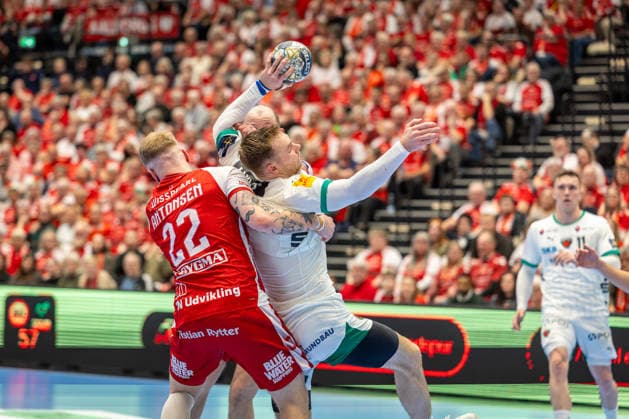 Aalborg Handball v Fuchse Berlin, EHF Champions League handball, Aalborg, Denmark Aalborg, Denmark. 04th, March 2026. Mathias Gidsel (19) of Fuchse Berlin and Rene Antonsen (22) of Aalborg Handball seen during the EHF Champions League match between Aalborg Handball and Füchse Berlin at Sparekassen Danmark Arena in Aalborg. Denmark, Aalborg  Copyright: xGonzalesxPhoto MadsxAndersenx