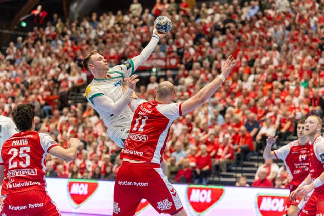 Aalborg Handball v Fuchse Berlin, EHF Champions League handball, Aalborg, Denmark Aalborg, Denmark. 04th, March 2026. Mathias Gidsel (19) of Fuchse Berlin and Simon Hald (11) of Aalborg Handball seen during the EHF Champions League match between Aalborg Handball and Füchse Berlin at Sparekassen Danmark Arena in Aalborg. Denmark, Aalborg  Copyright: xGonzalesxPhoto MadsxAndersenx