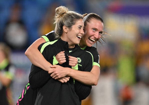 SOCCER ASIAN CUP IRAN AUSTRALIA, Kyra Cooney-Cross (l) and Clare Hunt of Australia celebrate following the AFC Women™s Asian Cup Group A match between Iran and Australia at Cbus Super Stadium on the Gold Coast, Thursday, March 5, 2026. ( NO ARCHIVING, EDITORIAL USE ONLY GOLD COAST QUEENSLAND AUSTRALIA  Copyright: xDAVExHUNTx 20260305131116355391