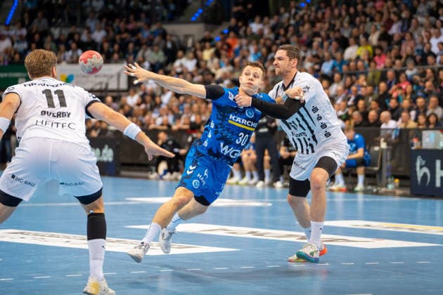 Handball I Men I Season 2025 2026 I Bundesliga I 24 Matchday I TVB Stuttgart THW Kiel I 05 03 2026 Marco Mengon 30, TVB Stuttgart defended by Hendrik Pekeler 61, THW Kiel Stuttgart Porsche Arena Baden Württemberg Germany Copyright: xLobeca MaxxPetershansx