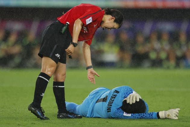 GOLD COAST, AUSTRALIA - MARCH 05 Match official Asaka Koizumi talks to Goalkeeper Raha Yazdani (1 IR Iran) while injured during the Womens Asian Cup match between Islamic Republic of Iran and Australia at the Gold Coast Stadium on March 05 2026 in Gold Coast, Australia Copyright: xMatthewxStarlingx xSPPx Sportspressphoto_SPR102857