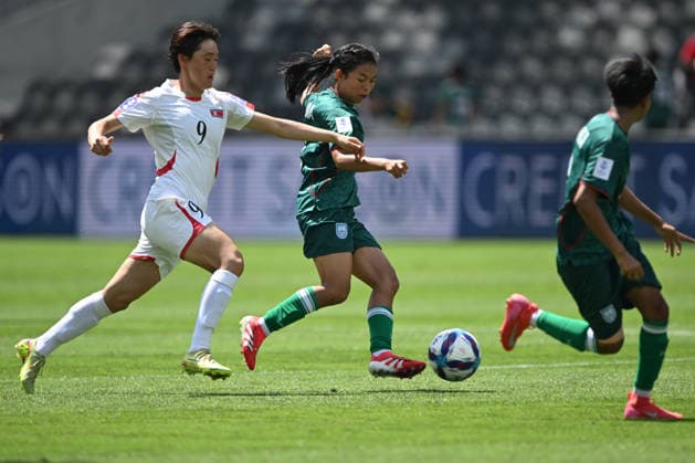 SOCCER ASIAN CUP BANGLADESH NORTH KOREA, Maria Manda of Bangladesh and Kim Song Gyong of North Korea during the AFC Women™s Asian Cup Group B match between Bangladesh and North Korea at CommBank Stadium in Sydney, Friday, March 6, 2026. ( NO ARCHIVING, EDITORIAL USE ONLY SYDNEY NEW SOUTH WALES AUSTRALIA  Copyright: xDEANxLEWINSx 20260306154665118343