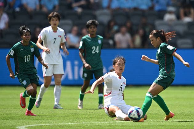 SOCCER ASIAN CUP BANGLADESH NORTH KOREA, An Kuk Hyang of North Korea tackles Ritu Porna Chakma of Bangladesh during the AFC Women™s Asian Cup Group B match between Bangladesh and North Korea at CommBank Stadium in Sydney, Friday, March 6, 2026. ( NO ARCHIVING, EDITORIAL USE ONLY SYDNEY NEW SOUTH WALES AUSTRALIA  Copyright: xDEANxLEWINSx 20260306179080359609