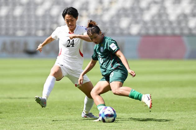 SOCCER ASIAN CUP BANGLADESH NORTH KOREA, Ri Song A of North Korea and Monika Chakma of Bangladesh during the AFC Women™s Asian Cup Group B match between Bangladesh and North Korea at CommBank Stadium in Sydney, Friday, March 6, 2026. ( NO ARCHIVING, EDITORIAL USE ONLY SYDNEY NEW SOUTH WALES AUSTRALIA  Copyright: xDEANxLEWINSx 20260306155700023468