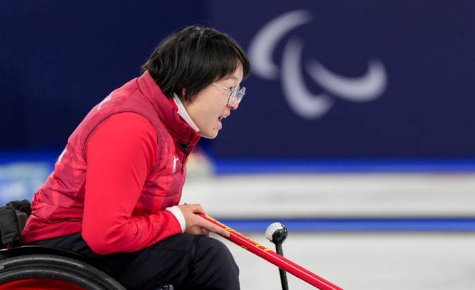 (260306) -- CORTINA D AMPEZZO, March 6, 2026 -- Wang Meng of China reacts during the wheelchair curling mixed doubles round robin session 4 match between China and South Korea at the Milan-Cortina 2026 Paralympic Winter games, Winterspiele,Spiele, Summer games in Cortina D ampezzo, Italy, March 6, 2026. ) (SP)ITALY-CORTINA D AMPEZZO-PARALYMPIC WINTER GAMES-WHEELCHAIR CURLING-MIXED DOUBLES WangxKaiyan 