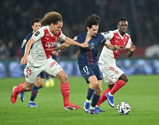 PSG vs AS Monaco: French Ligue 1 PARIS, FRANCE - MARCH 06: Vitinha (C) of Paris Saint - Germain in action against Wout Faes (L) of Monaco during the French Ligue 1 (L1) soccer match between Paris Saint-Germain (PSG) and AS Monaco at Parc des Princes stadium in Paris, France on March 06, 2026. Mustafa Yalcin Anadolu Paris France. Editorial use only. Please get in touch for any other usage.  Copyright: x2026xAnadoluxMustafaxYalcinx