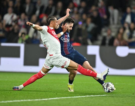 PSG vs AS Monaco: French Ligue 1 PARIS, FRANCE - MARCH 06: Khvicha Kvaratskhelia (R) of Paris Saint - Germain in action against Thilo Kehrer (L) of Monaco during the French Ligue 1 (L1) soccer match between Paris Saint-Germain (PSG) and AS Monaco at Parc des Princes stadium in Paris, France on March 06, 2026. Mustafa Yalcin Anadolu Paris France. Editorial use only. Please get in touch for any other usage.  Copyright: x2026xAnadoluxMustafaxYalcinx