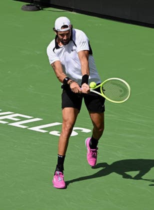 INDIAN WELLS, CA - MARCH 06: Matteo Berrettini (ITA) returns the ball during an ATP, Tennis Herren tennis match during the BNP Paribas Open played on March 6, 2026 at the Indian Wells Tennis Garden in Indian Wells, CA. (Photo by John Cordes Icon Sportswire) TENNIS: MAR 06 BNP Paribas Open EDITORIAL USE ONLY Icon506260306016