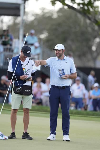 ORLANDO, FL - MARCH 06: PGA, Golf Herren golfer Scottie Scheffler talks to his caddie on the 9th hole on March 6, 2026, during the Arnold Palmer Invitational presented by Mastercard at Arnold Palmer™s Bay Hill Club & Lodge in Orlando, Florida. (Photo by Brian Spurlock Icon Sportswire) GOLF: MAR 06 PGA Arnold Palmer Invitational presented by Mastercard EDITORIAL USE ONLY Icon26030619