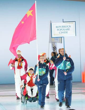(260307) -- VERONA, March 7, 2026 -- Members of the delegation of China parade during the opening ceremony of Milan-Cortina 2026 Paralympic Winter games, Winterspiele,Spiele, Summer games at Verona Olympic Arena in Verona, Italy, March 6, 2026. ) (SP)ITALY-VERONA-PARALYMPIC WINTER GAMES-OPENING CEREMONY LixJing 
