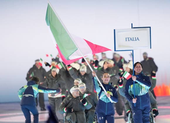 (260307) -- VERONA, March 7, 2026 -- Members of the delegation of Italy parade during the opening ceremony of Milan-Cortina 2026 Paralympic Winter games, Winterspiele,Spiele, Summer games at Verona Olympic Arena in Verona, Italy, March 6, 2026. ) (SP)ITALY-VERONA-PARALYMPIC WINTER GAMES-OPENING CEREMONY LixJing 