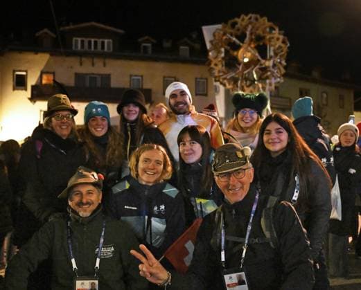 Milan Cortina Paralympics: Opening ceremony People pose for a photo in front of the Paralympic flame lit in the cauldron in Cortina d Ampezzo, Italy, on March 6, 2026, during the opening ceremony of the Milan Cortina Paralympics in Verona.  A14AA0005355670P