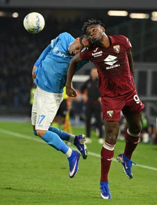 (260307) -- NAPLES, March 7, 2026 -- Napoli s Mathias Olivera (L) vies with Torino s Duvan Zapata during a Serie A football match between Napoli and Torino in Naples, Italy, March 6, 2026. (Photo by Xinhua) (SP)ITALY-NAPLES-FOOTBALL-SERIE A-NAPOLI VS TORINO AlbertoxLingria 