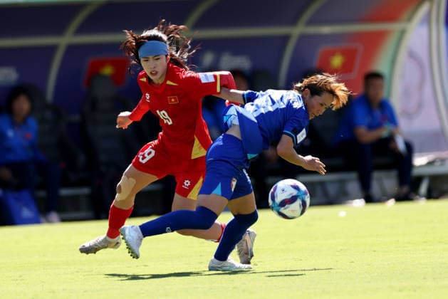 SOCCER ASIAN CUP TAIWAN VIETNAM, Vietnam™s Nguyen Thi Thanh Nha clashes with Chinese Taipei™s Chen Jin-wenduring the AFC Women™s Asian Cup Group C match between Taiwan and Vietnam at HBF Park in Perth, Saturday, March 7, 2026. ( NO ARCHIVING, EDITORIAL USE ONLY PERTH WESTERN AUSTRALIA AUSTRALIA  Copyright: xCOLINxMURTYx 20260307168709724718