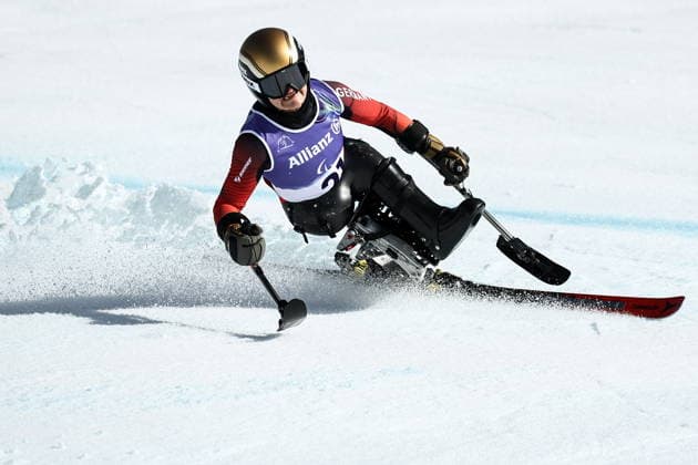 ITALY, VENETO - MARCH 7, 2026: Anna-Lena Forster of Germany competes in the women s downhill sit-skiing event during the 2026 Winter Paralympic Games on the Olympia delle Tofane of the Tofane Alpine Skiing Centre in Cortina d Ampezzo, Province of Belluno. Mikhail Tereshchenko TASS  89689618