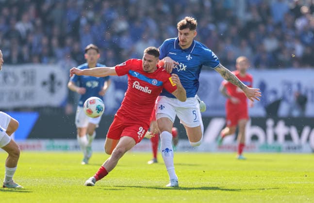 07 03 2026, Soccer 2 Bundesliga, SV Darmstadt 98 Holstein Kiel, emonline, emspor, despor, v l , Marcus Müller Holstein Kiel , Matej Maglica SV Darmstadt 98 DFL DFB REGULATIONS PROHIBIT ANY USE OF PHOTOGRAPHS AS IMAGE SEQUENCES AND OR QUASI VIDEO xdcx Copyright: HMBxMedia Claus