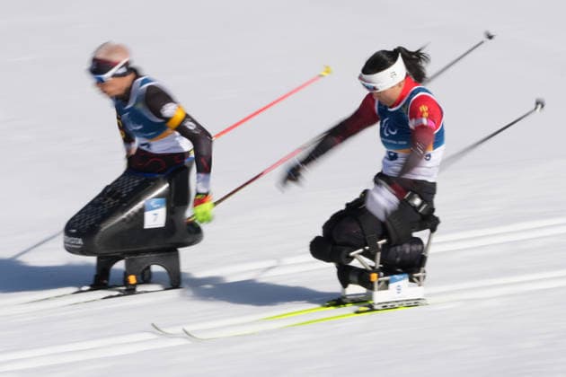 (260307) -- TESERO, March 7, 2026 -- Zhai Yuxin (R) of China competes during the women s sprint sitting final of para biathon at the Milan-Cortina 2026 Paralympic Winter games, Winterspiele,Spiele, Summer games in Tesero, Italy, March 7, 2026. ) (SP)ITALY-TESERO-PARALYMPIC WINTER GAMES-PARA BIATHLON-WOMEN S SPRINT SITTING LianxZhen 