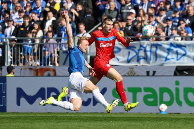 2026 03 07 xjfx 2 Bundesliga SV Darmstadt 98 Holstein Kiel v l , Isac Alexi Sivert Lidberg SV Darmstadt 98 , David Zec Holstein Kiel Zweikampf, Action, Aktion, Battles for the Ball DFL DFB REGULATIONS PROHIBIT ANY USE OF PHOTOGRAPHS as IMAGE SEQUENCES and or QUASI VIDEO Copyright: JoaquimxFerreira