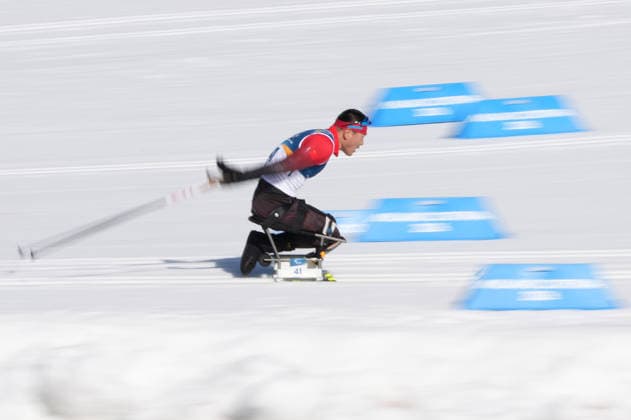 (260307) -- TESERO, March 7, 2026 -- Wang Tao of China competes during the men s sprint sitting final of para biathon at the Milan-Cortina 2026 Paralympic Winter games, Winterspiele,Spiele, Summer games in Tesero, Italy, March 7, 2026. ) (SP)ITALY-TESERO-PARALYMPIC WINTER GAMES-PARA BIATHLON-MEN S SPRINT SITTING LianxZhen 