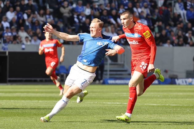 07 03 2026, xtvx, Fußball 2 Bundesliga, SV Darmstadt 98 Holstein Kiel v l Zweikampf, Duell, duel, tackle, compete Isac Lidberg SV Darmstadt 98 David Zec Holstein Kiel DFL DFB REGULATIONS PROHIBIT ANY USE OF PHOTOGRAPHS as IMAGE SEQUENCES and or QUASI VIDEO Darmstadt