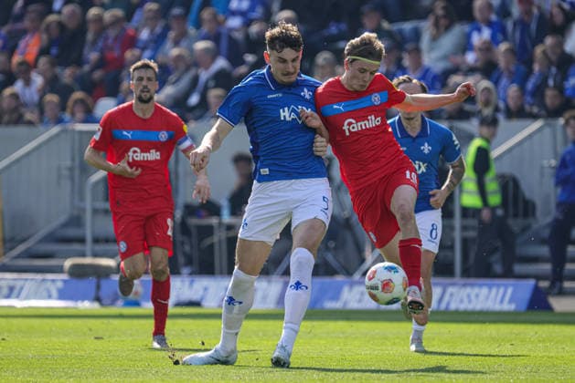 07 03 2026, xhettx, Soccer 2 Bundesliga, SV Darmstadt 98 Holstein Kiel v l Fight for the ball Grayson Dettoni SV Darmstadt 98, 4 and Jonas Torrissen Therkelsen KSV Holstein Kiel, 10 DFL DFB REGULATIONS PROHIBIT ANY USE OF PHOTOGRAPHS as IMAGE SEQUENCES and or QUASI VIDEO