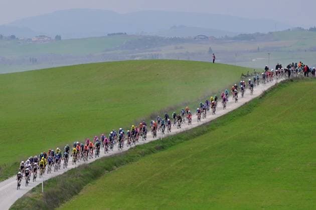 The pack of riders pictured in action during the men elite Strade Bianche one day cycling race, 203km from and to Siena, Italy on Saturday 07 March 2026. DIRKxWAEM  x166735303x