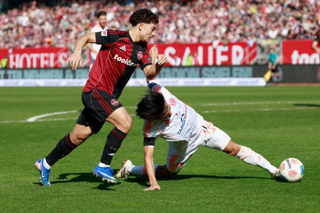 f l n r Marko Soldic 1 FC Nürnberg and Satoshi Tanaka Fortuna Düsseldorf Football 2 Bundesliga, 1 FC Nürnberg - Fortuna Düsseldorf at the Max Morlock Stadion, Nuremberg, Germany, on March 7, 2026 in action during the 2 Bundesliga match between 1 FC Nürnberg and Fortuna Düsseldorf at the Max Morlock Stadion, Nuremberg, Germany, on March 7, 2026 DFL REGULATIONS PROHIBIT ANY USE OF PHOTOGRAPHS AS IMAGE SEQUENCES AND OR QUASI VIDEO Copyright: HMBxMedia xHeikoxBecker
